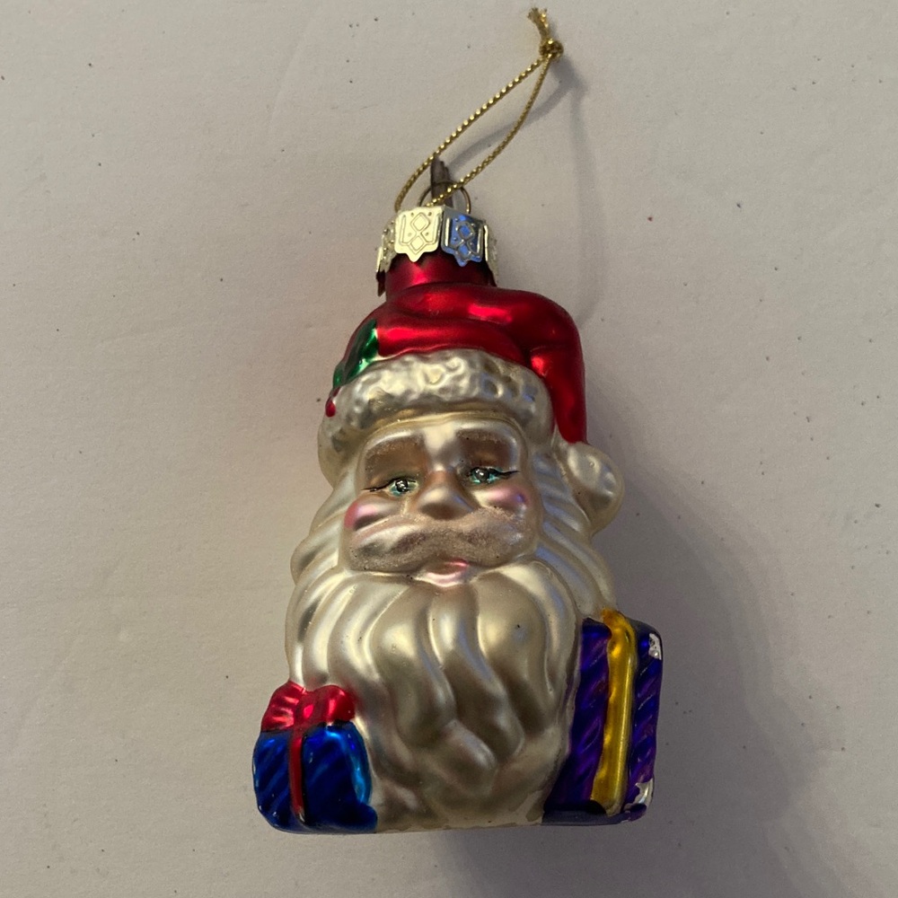 Festive Thomas Pacconi Santa Head Glass Ornament in Red, White, Blue, Purple